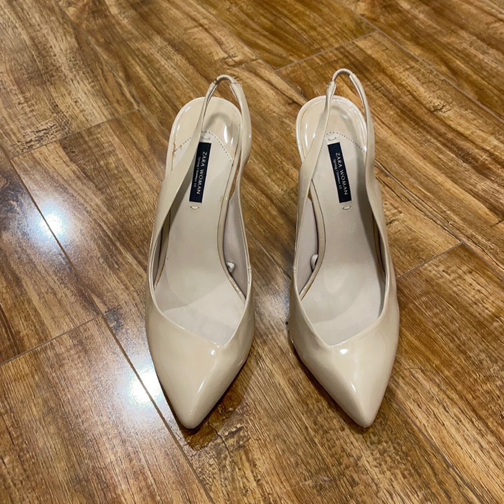 Zara patent leather nude slingback heels.